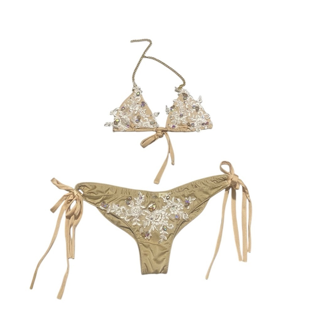 Smooch Embellished Gold Bikini set It doesn't have a size top S , and bottom M.
